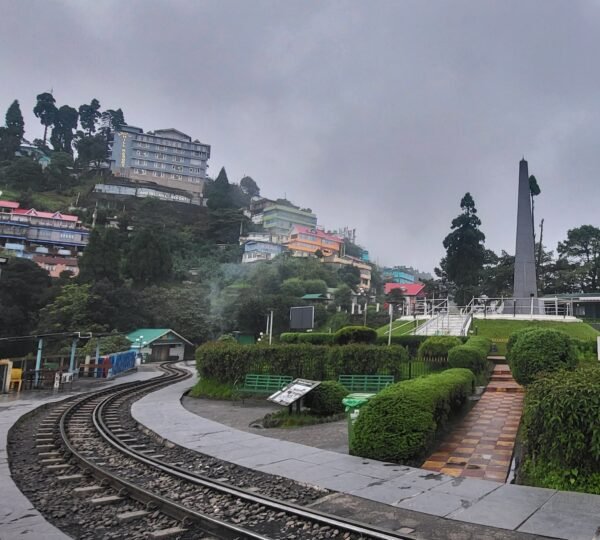 Batasia Loop Gorkha War Memorial with toy train tracks in Darjeeling Caption: Batasia Lo