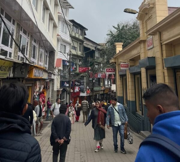 Chowrasta Mall Road Darjeeling with shops and Himalayan views
