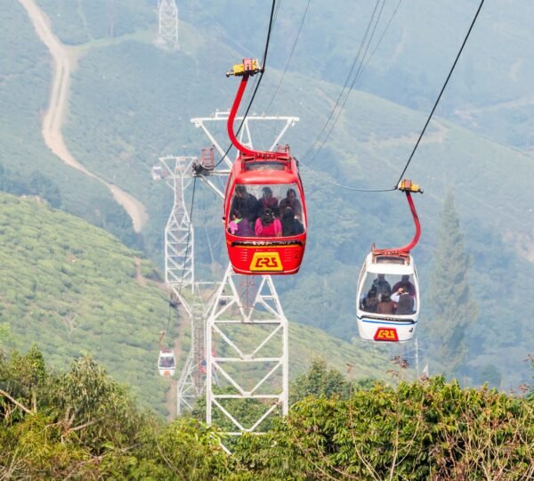 Aerial ropeway cable cars offering panoramic views of Gangtok city and mountains.